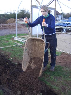 Filling The Outside Garden Bed With Soil.